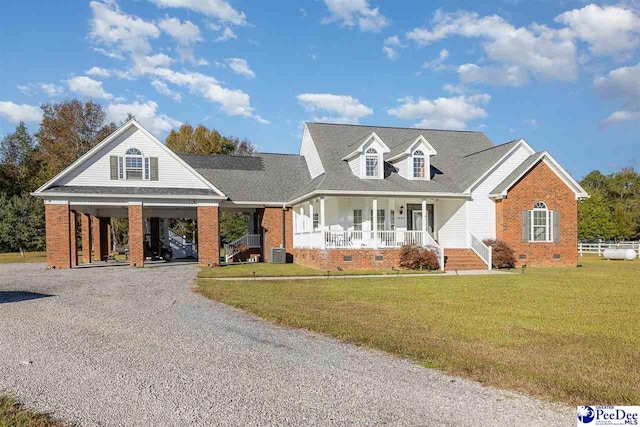 1555 Big Swamp Rd, Pamplico, SC 29583 - view of front facade with cooling unit, a front yard, and covered porch