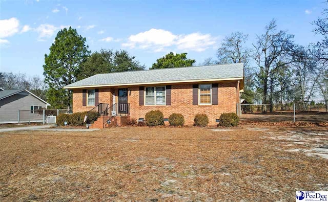 ranch-style house with crawl space, brick siding, and fence