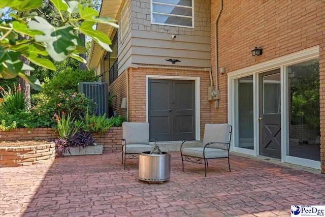 view of patio with cooling unit