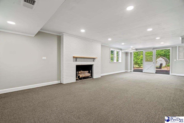 unfurnished living room with a fireplace, ornamental molding, and carpet flooring