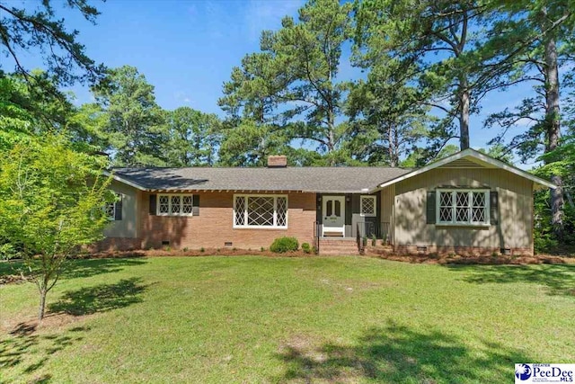 ranch-style home with a front yard