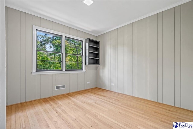 empty room with light wood-type flooring