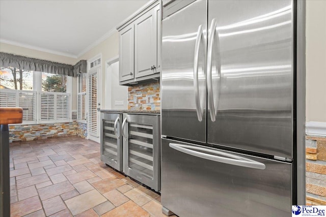3406 Sussex Ct, Florence, SC 29501 - kitchen featuring crown molding, wine cooler, and stainless steel fridge