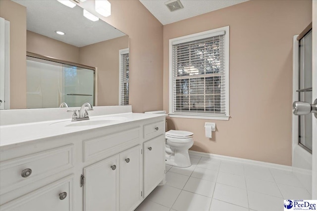 3406 Sussex Ct, Florence, SC 29501 - full bathroom featuring bath / shower combo with glass door, vanity, toilet, and tile patterned flooring