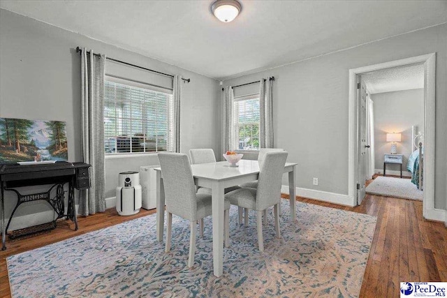 907 Adams Ave, Florence, SC 29501 - dining space with wood finished floors and baseboards