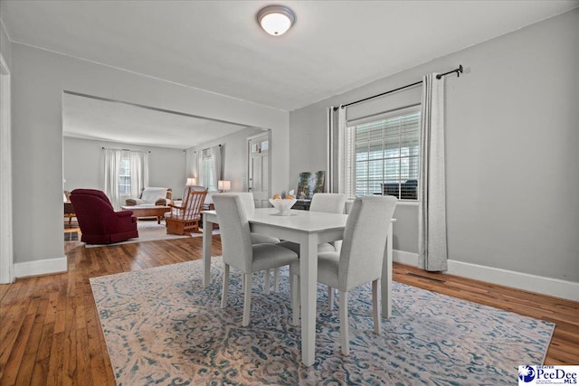 907 Adams Ave, Florence, SC 29501 - dining room with wood finished floors and baseboards