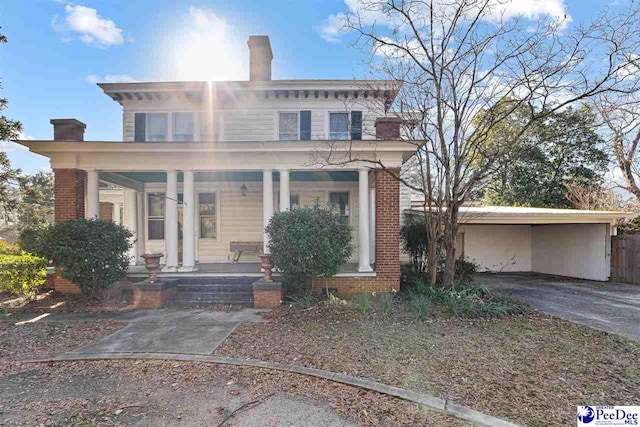 italianate home with covered porch