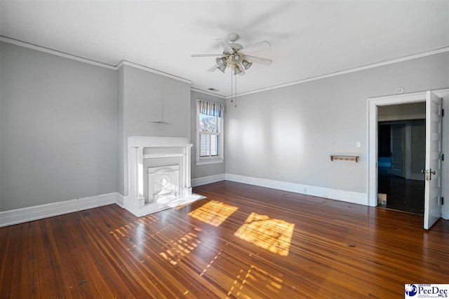 unfurnished living room with crown molding, ceiling fan, and dark hardwood / wood-style floors