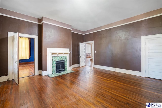 unfurnished living room featuring hardwood / wood-style floors