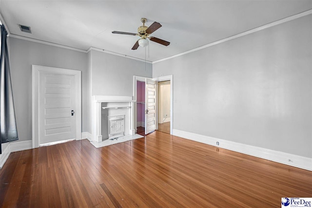 unfurnished living room featuring crown molding, ceiling fan, and wood-type flooring