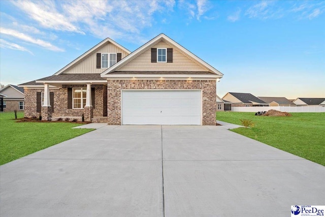 4064 Crest Cv, Florence, SC 29501 - craftsman-style home featuring brick siding, driveway, and a front lawn