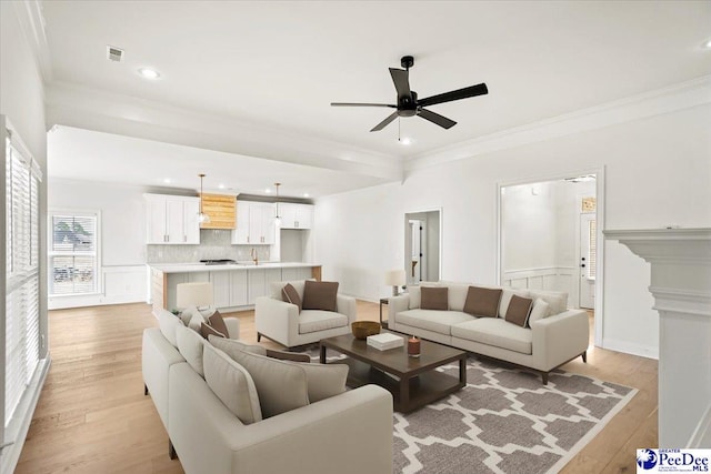 4064 Crest Cv, Florence, SC 29501 - living room with light wood-type flooring and ornamental molding