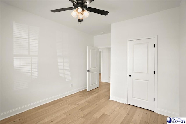 4064 Crest Cv, Florence, SC 29501 - unfurnished bedroom featuring baseboards, ceiling fan, and light wood finished floors
