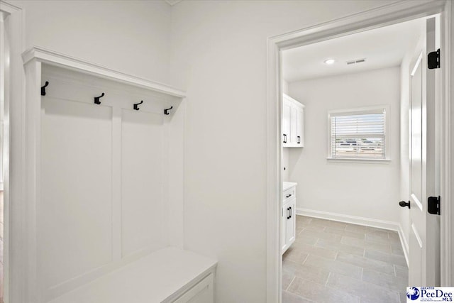 4064 Crest Cv, Florence, SC 29501 - mudroom featuring visible vents and baseboards