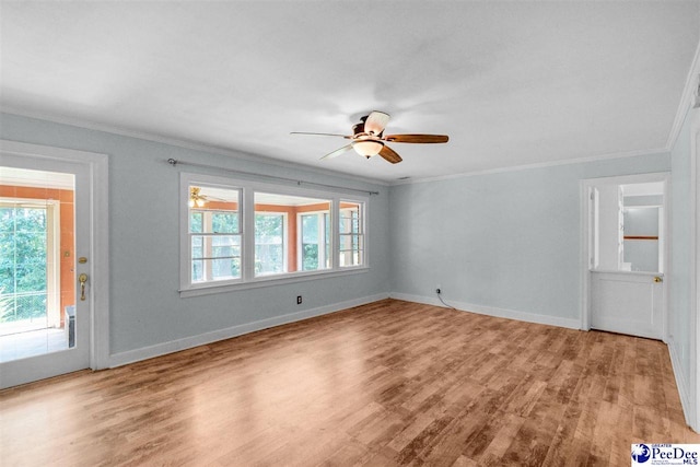 23 Mcrae Rd, Cheraw, SC 29520 - spare room with plenty of natural light, ceiling fan, wood finished floors, and ornamental molding