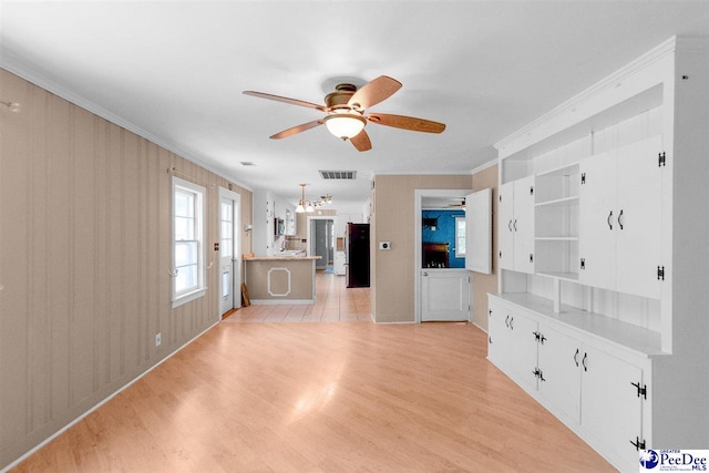 23 Mcrae Rd, Cheraw, SC 29520 - unfurnished living room featuring ceiling fan, crown molding, and light wood-style floors
