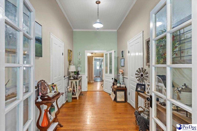 116 Moore St, Bennettsville, SC 29512 - entrance foyer featuring crown molding, french doors, and wood finished floors