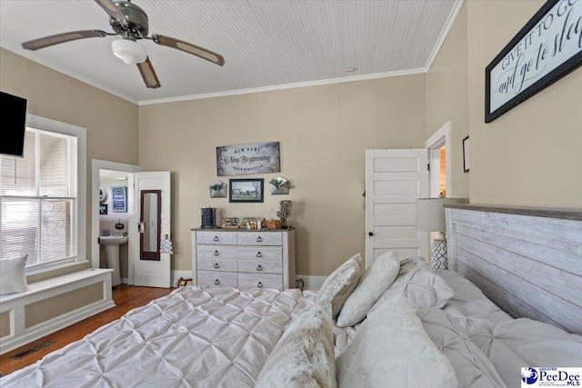 116 Moore St, Bennettsville, SC 29512 - bedroom with crown molding, wood finished floors, and ceiling fan