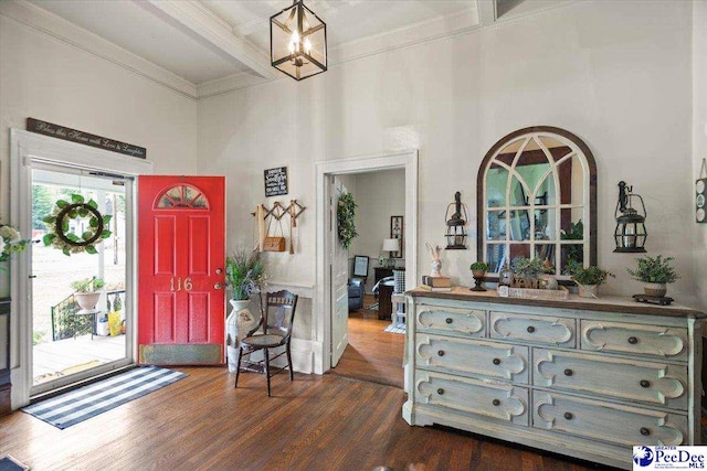 116 Moore St, Bennettsville, SC 29512 - foyer with a towering ceiling, dark wood finished floors, ornamental molding, and beam ceiling