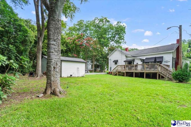 116 Moore St, Bennettsville, SC 29512 - view of green lawn featuring a deck and stairway