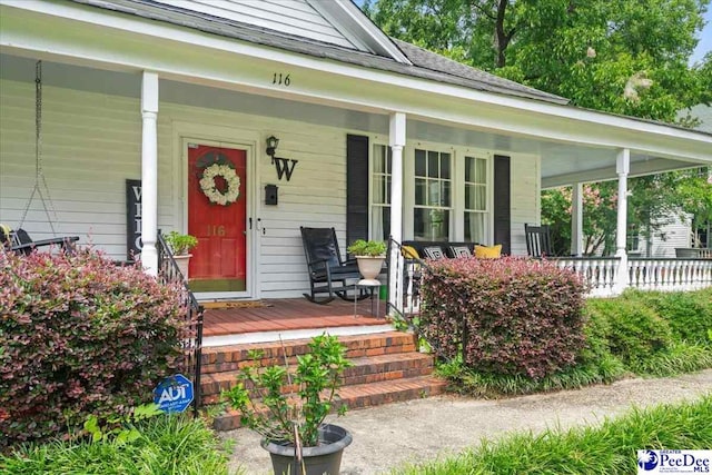 116 Moore St, Bennettsville, SC 29512 - property entrance featuring covered porch