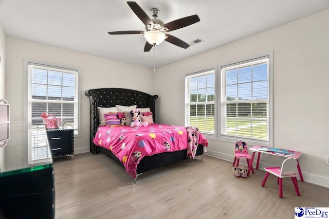 1613 Timmonsvillel Hwy, Darlington, SC 29532 - bedroom featuring wood finished floors and a ceiling fan