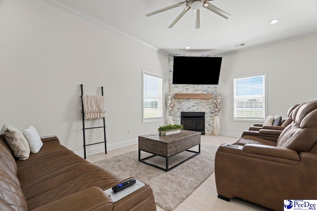 1613 Timmonsvillel Hwy, Darlington, SC 29532 - living room featuring ceiling fan, a fireplace, ornamental molding, light wood-style flooring, and recessed lighting