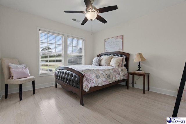 1613 Timmonsvillel Hwy, Darlington, SC 29532 - bedroom with light wood finished floors and ceiling fan
