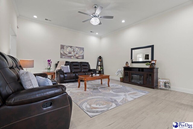 1613 Timmonsvillel Hwy, Darlington, SC 29532 - living area featuring ceiling fan, wood finished floors, ornamental molding, and recessed lighting