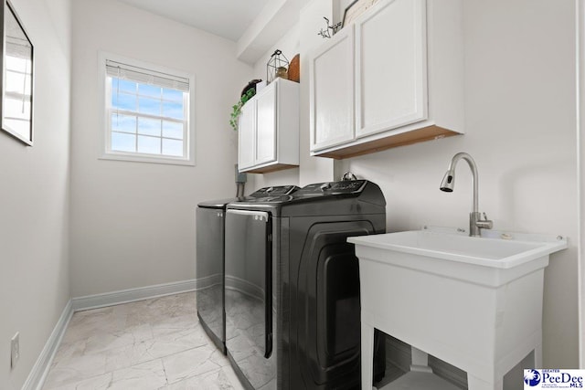 1613 Timmonsvillel Hwy, Darlington, SC 29532 - washroom with cabinet space, washing machine and clothes dryer, and light marble finish flooring