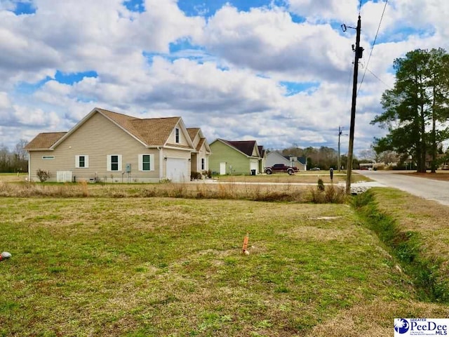 exterior space with a garage