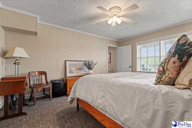 244 Timberlake Dr, Florence, SC 29501 - bedroom with crown molding, a textured ceiling, dark carpet, and ceiling fan