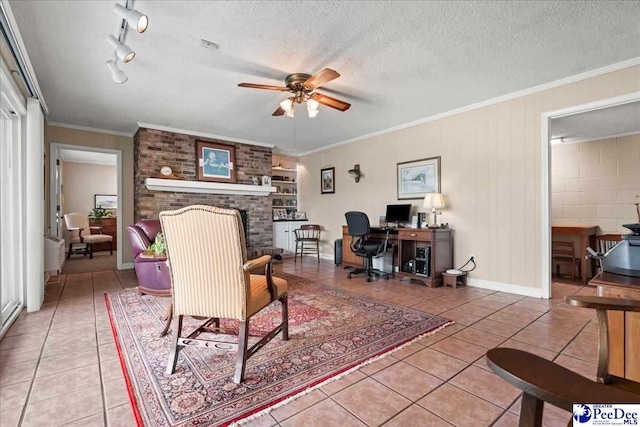 244 Timberlake Dr, Florence, SC 29501 - living room with light tile patterned floors, an office area, ceiling fan, a fireplace, and ornamental molding