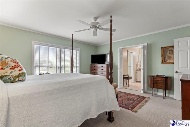 244 Timberlake Dr, Florence, SC 29501 - bedroom with crown molding, carpet floors, baseboards, ceiling fan, and ensuite bathroom