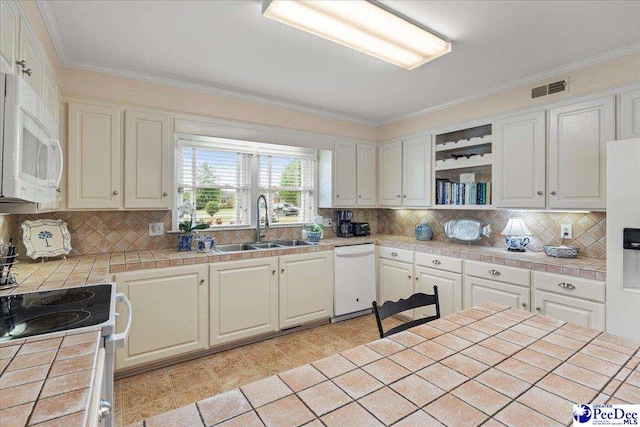244 Timberlake Dr, Florence, SC 29501 - kitchen featuring white appliances, a sink, tile countertops, open shelves, and backsplash