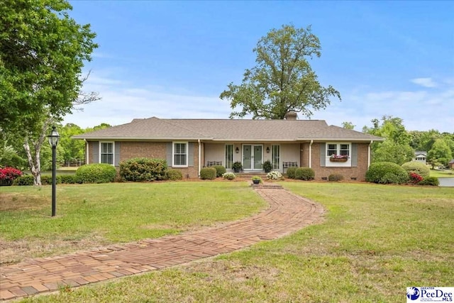 244 Timberlake Dr, Florence, SC 29501 - ranch-style home featuring a front lawn, brick siding, and a chimney