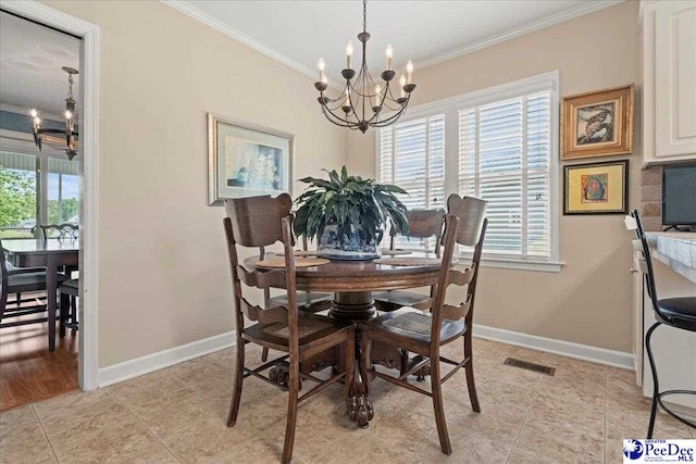 244 Timberlake Dr, Florence, SC 29501 - dining area with a chandelier, crown molding, plenty of natural light, and baseboards