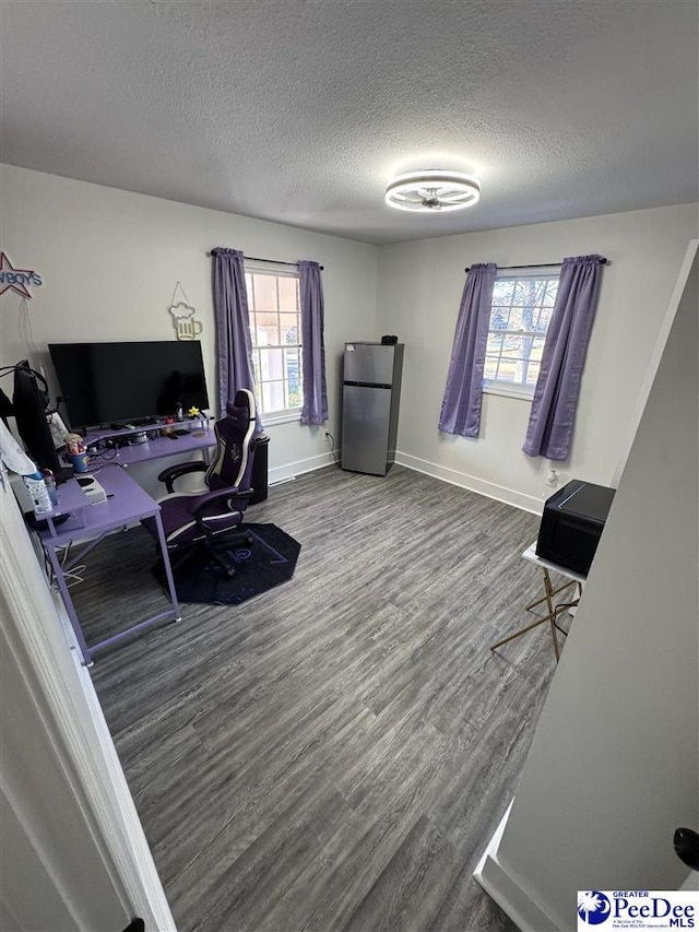 1770 Woods Dr, Florence, SC 29505 - office featuring a textured ceiling, wood finished floors, and baseboards