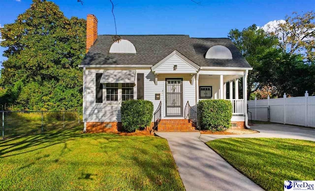 view of front of home with a front yard