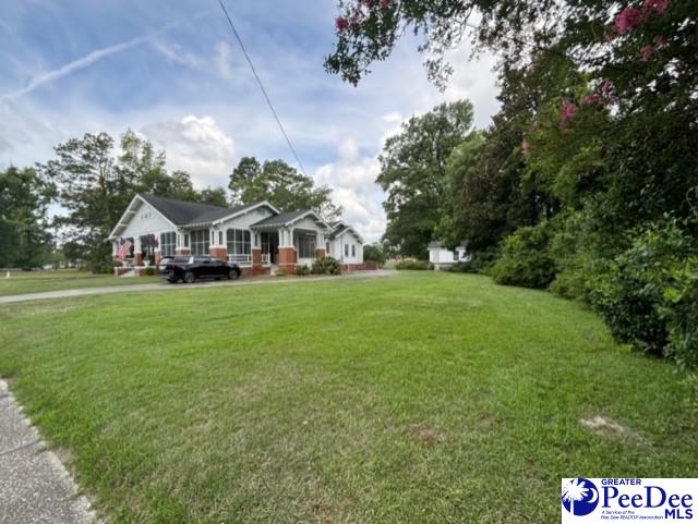 view of front of home with a front yard