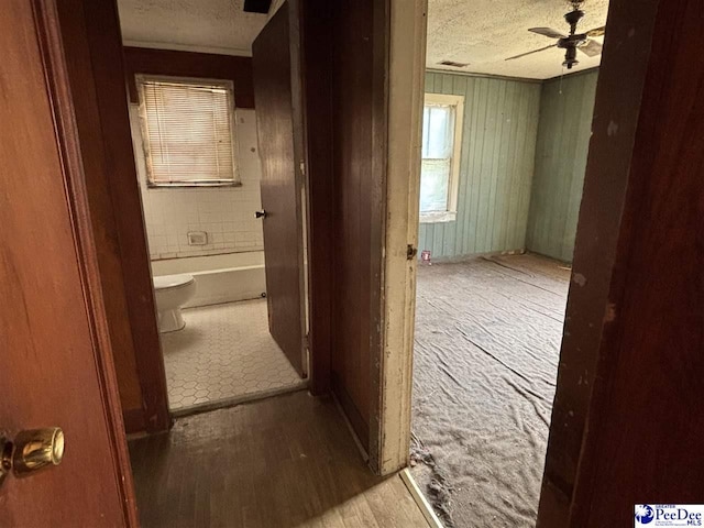 207 W Smith Ave, Darlington, SC 29532 - hall with a textured ceiling and wood finished floors
