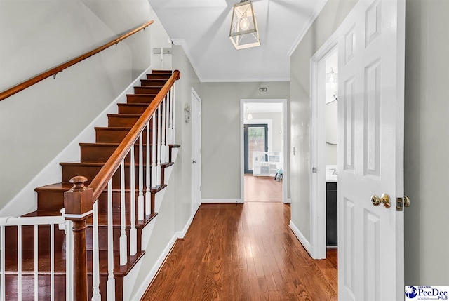 108 Wyandot St, Darlington, SC 29532 - entryway with ornamental molding, wood finished floors, and stairway
