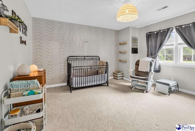 108 Wyandot St, Darlington, SC 29532 - carpeted bedroom featuring a crib and baseboards