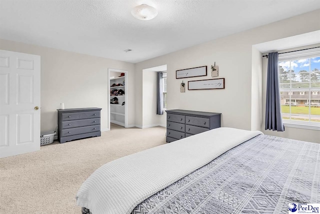 108 Wyandot St, Darlington, SC 29532 - carpeted bedroom featuring a textured ceiling and baseboards
