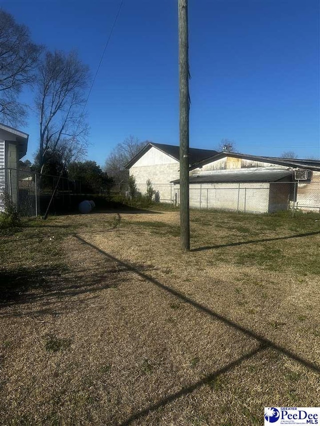 view of yard featuring fence