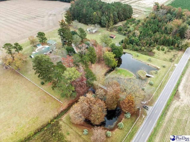 bird's eye view with a water view and a rural view