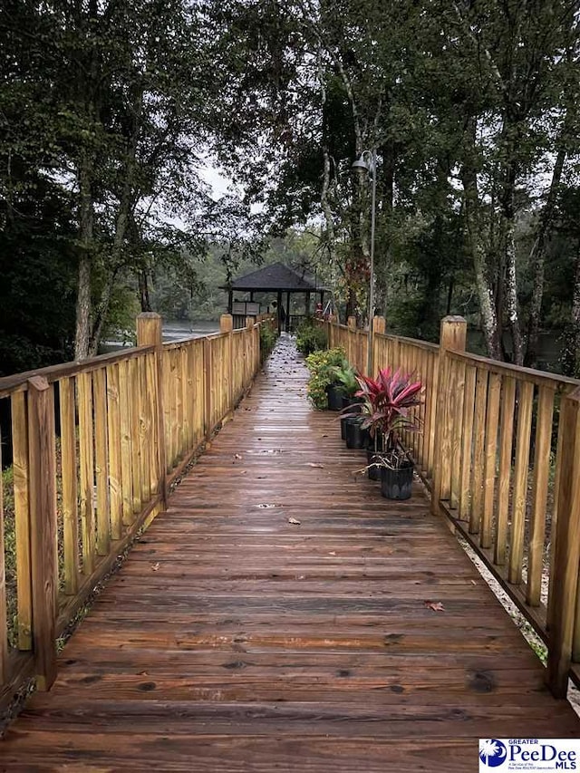 wooden terrace with a gazebo