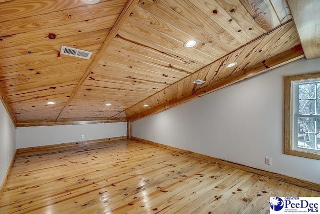 additional living space featuring wood ceiling, lofted ceiling, and hardwood / wood-style floors