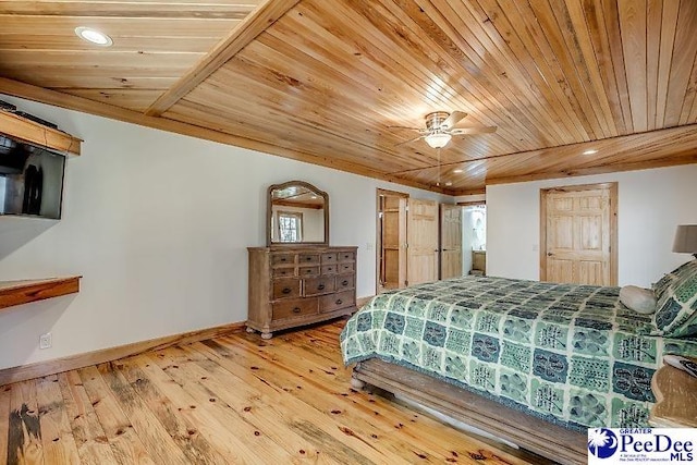 bedroom with wood-type flooring, wooden ceiling, and vaulted ceiling