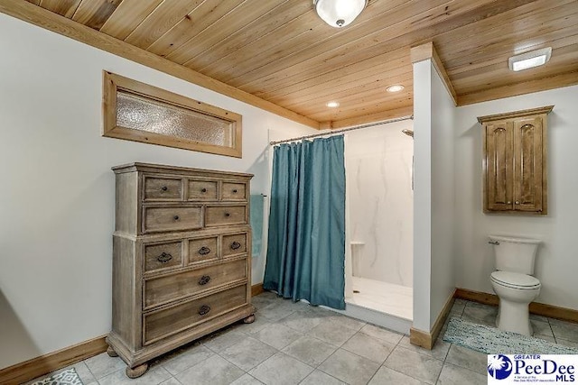 bathroom featuring toilet, wooden ceiling, tile patterned floors, and walk in shower